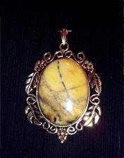 pendant, butterscotch jasper, leaf pattern, goldtone pendant, 40x30mm oval