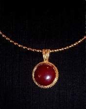 Necklace, round, 20mm, goldtone, bead edged pendant, Omega, cranberry carnelian, cabochon