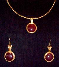 Necklace, round, 20mm, goldtone, bead edged pendant, Omega, cranberry carnelian, cabochon