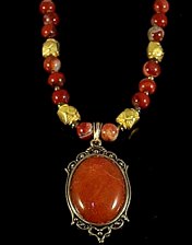 necklace, handmade, custom jewelry, bracelet, earrings, pendant, orange carnelian pendant, goldtone scroll setting, breeciated jasper, silvertone, toggle closure