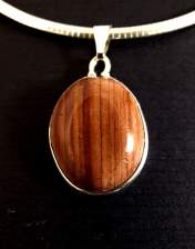 rhyolite pendant, oval, pink and brown striped stone, sterling silver, cinch mount, natural stone, cabochon pendant