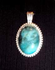 pendant, russian blue, silvertone bead pattern mount, 30x22